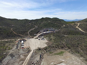 Ermitaño work yard with mining portal in the background